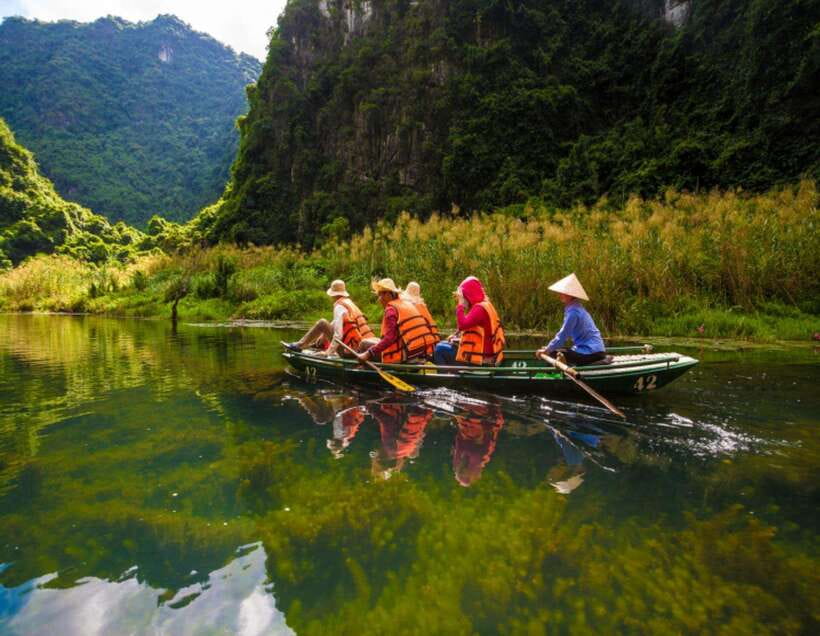 2-Day Ninh Binh Tour with Accommodation & Meals, Small Group - Tam Coc by boat, then a short ride through the fields