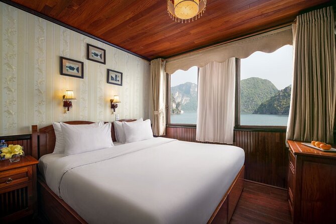 Bai Tu Long Bay Cruises Peaceful and Cozy Group Boat 2D1N - Thien Canh Son Cave: limestone formations up close