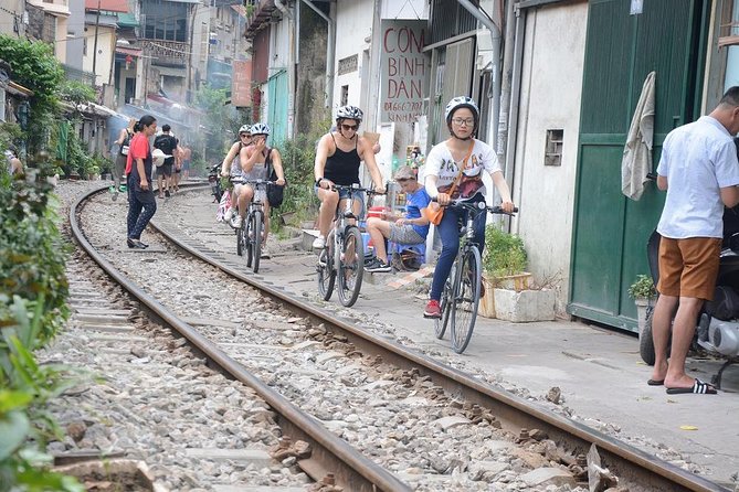 Bicycle Tours Hanoi: Half Day Hanoi City Bicycle Tours - Along the railway through the city
