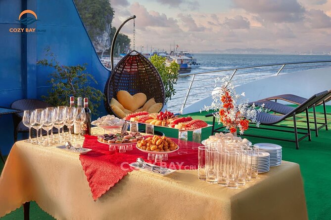 Cozy Bay Halong 5-Star Day Cruise, Buffet, Cave, Kayak, Swimming - Ti Top Island: beach time and a steep viewpoint