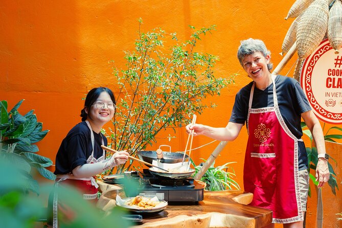 Experience Hanoi Cooking Class with Free Wine Tasting - From Đồng Xuân Market to the cooking studio