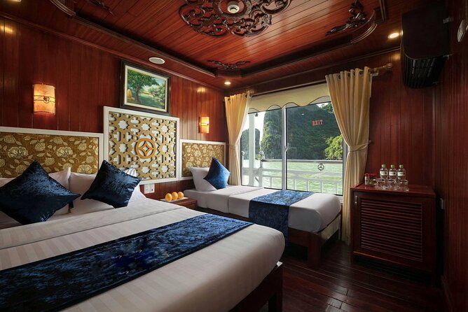From Hanoi: 2D1N Ha Long Bay Deluxe Cruise with Bus Limousine - Dinner, cabin and evening on board