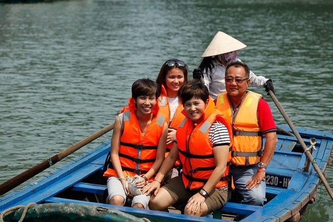 Group Halong Bay Day Cruise Including Hotel Transfers from Hanoi - Kayaking, bamboo boats, and extra costs