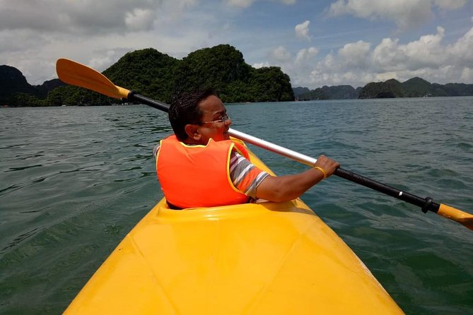 Ha Long Bay Six Hours Trip Kayaking & Swimming on Beach - Swimming and climbing for a wider view