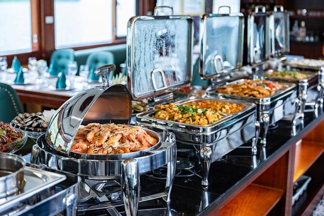 Halong bay 5star Cruise Day Trip: Buffet lunch & Limousine bus - Titop Island for a beach break or a summit view