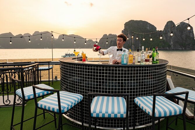 Halong Bay Day Tour With Sunlight Luxury Cruise With Transfer - Hang Luon: Choose a Paddle or Bamboo Boat