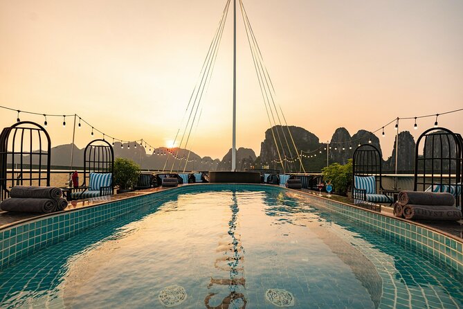 Halong Bay Day Tour With Sunlight Luxury Cruise With Transfer - Sunset Snacks and the Return to Hanoi