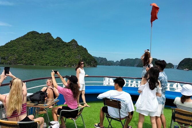Halong Bay Day Tour With Titop Island, Cave, Kayak & Lunch - Kayak or bamboo boat at Luon Cave