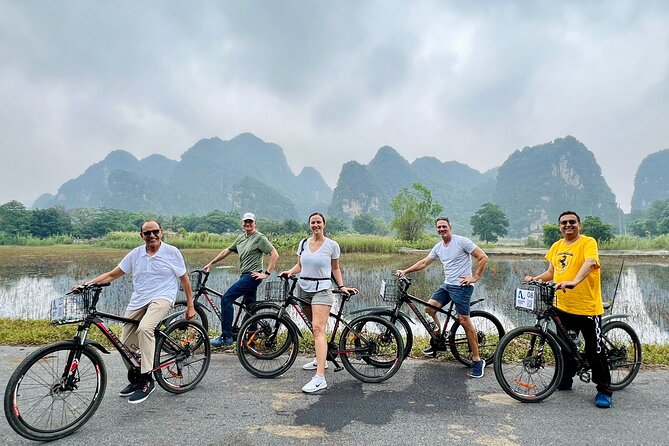 Hang Mua - Hoa Lu - Tam Coc Small Group Tour 8 People a Group - Hang Mua: a climb for the view over Tam Coc