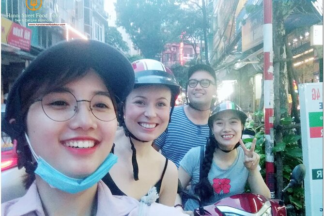Hanoi old quarter sightseeing & street food eating by Motorcycle - Six to eight stops, with room for local character