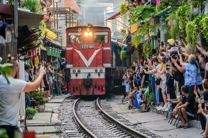 Hanoi Street Food Adventure: Train Street & Local Delights - The guide’s role is more than ordering food