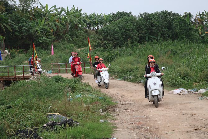 Hanoi Vespa Countryside Tour With Female Ao Dai Riders Half Day - Pagodas, local life, and a different view of Hanoi