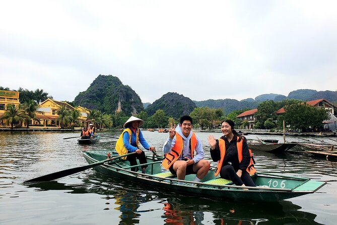 Highlight Ninh Binh Full Day Tour Tam Coc Boat, Mua Cave, Hoa Lu - The village bike ride adds a slower, local scale