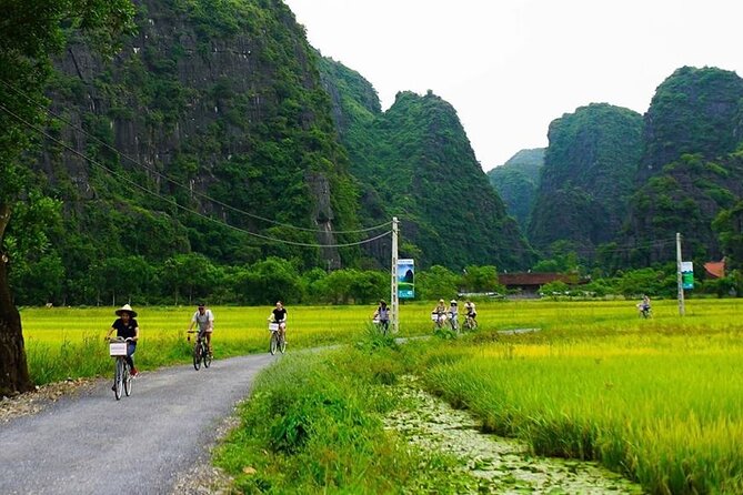 Ninh Binh Tour: Deluxe & Small Group Tam Coc Hoa Lu - Boat, Biking, Buffet Lunch - Cycling through Tam Coc’s villages