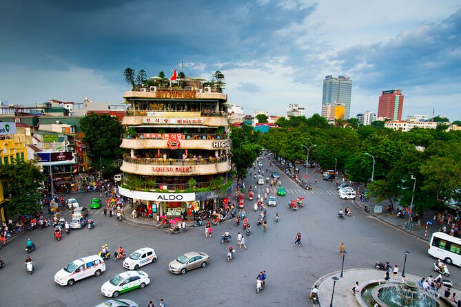 Private Hanoi Street Food Tour With Mr.Ha - Walking through food and city life