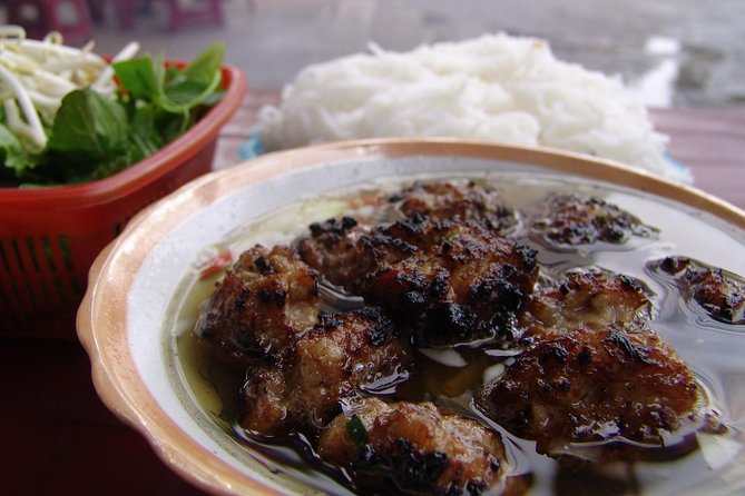 Private Hanoi Street Food Walking Tour With Real Foodie - Taste a meal’s worth of changing dishes