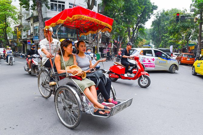 Small-Group Street Food Cyclo Tour of Hanoi Old Quarter - Taking a 30-minute cyclo ride