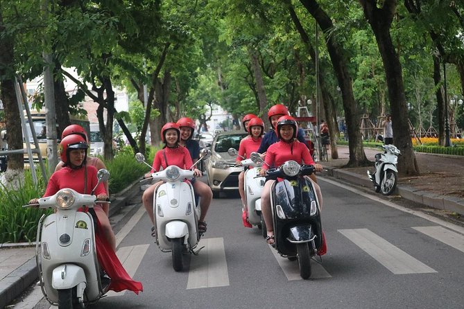 Vespa City Tour &Train Street Female With Ao Dai Riders 4,5 Hours - Long Bien Bridge and the city’s changing edges