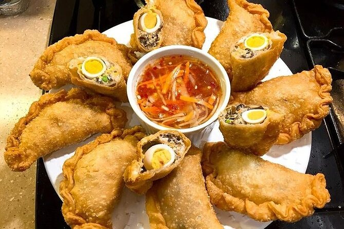 Vespa Female Ao Dai riders Night Street Food + See Train Street - Should you book the Hanoi night Vespa tour?